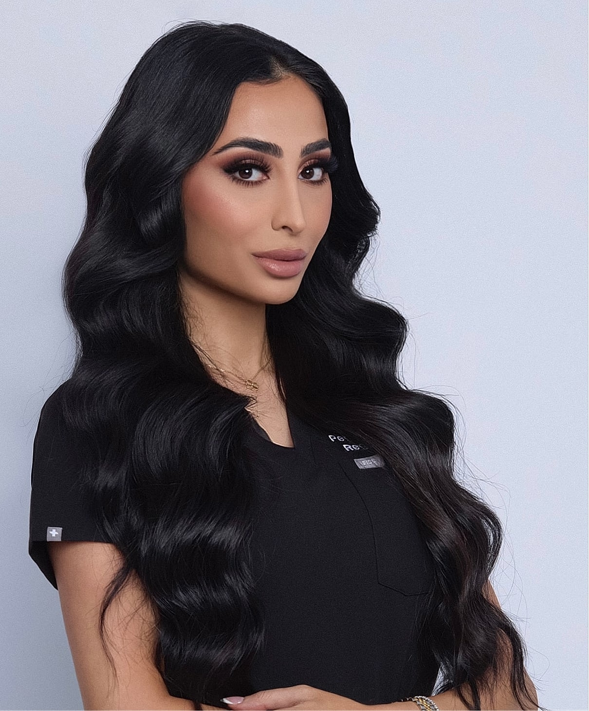 Group of stylish individuals posing together.